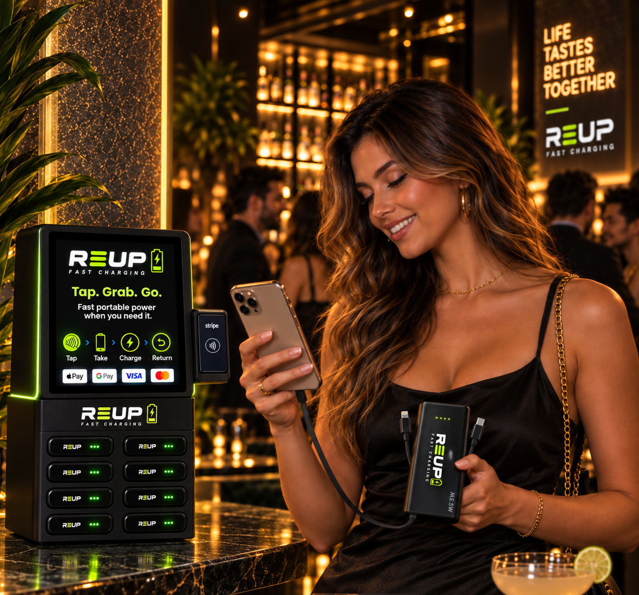 Woman at a bar using a REUP charging station and branded power bank